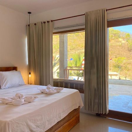 Отель Sky Mountain Views Kuta  Экстерьер фото