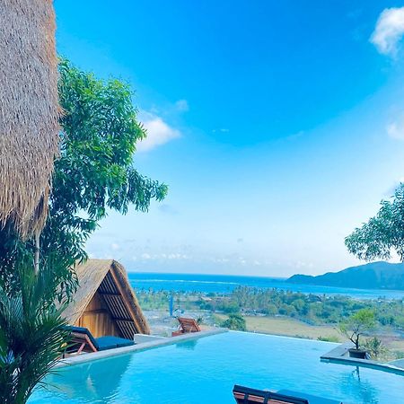 Отель Sky Mountain Views Kuta  Экстерьер фото