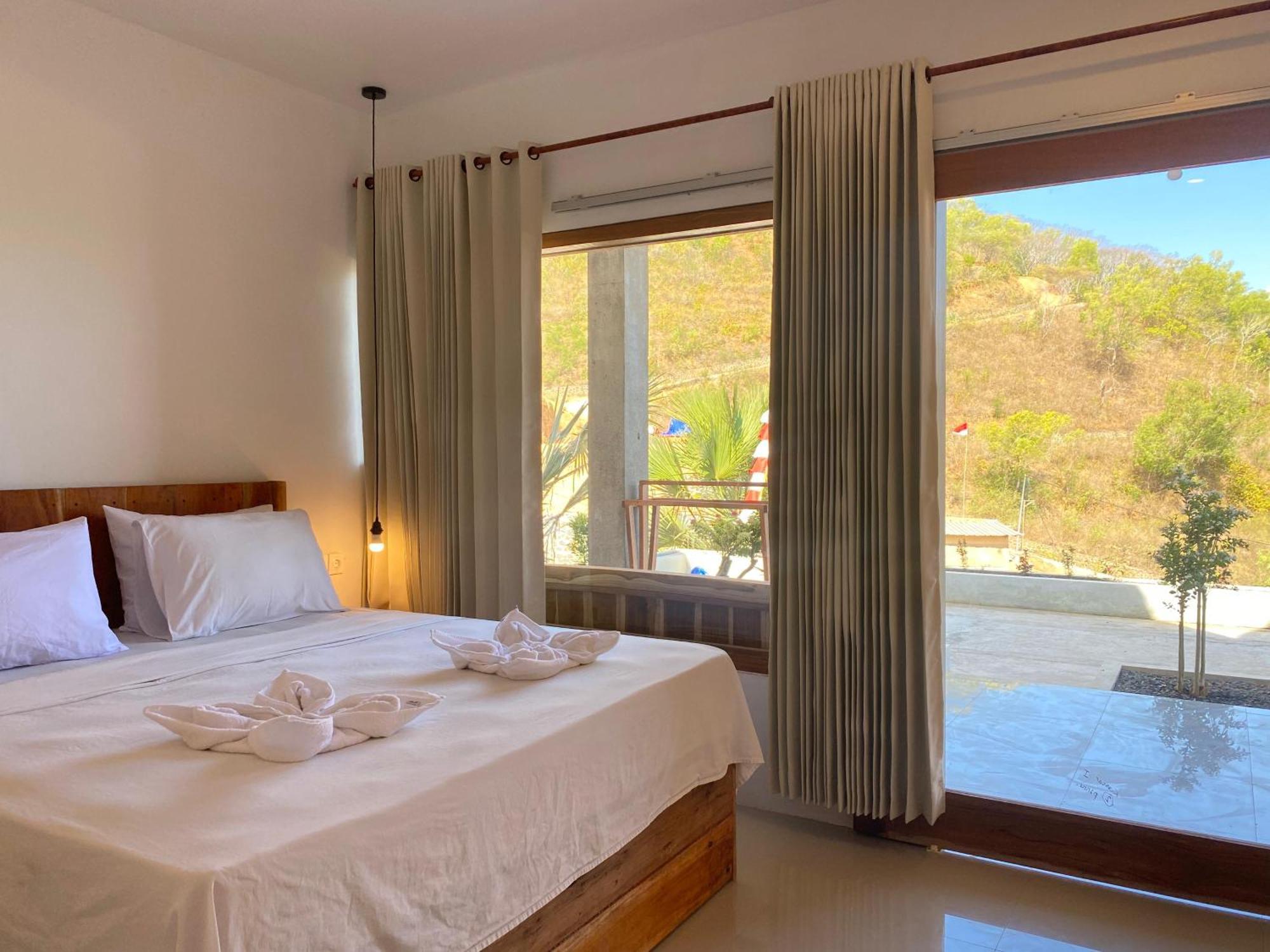 Отель Sky Mountain Views Kuta  Экстерьер фото